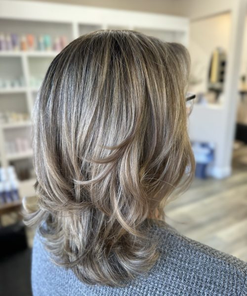 ashy blonde and cut by cam